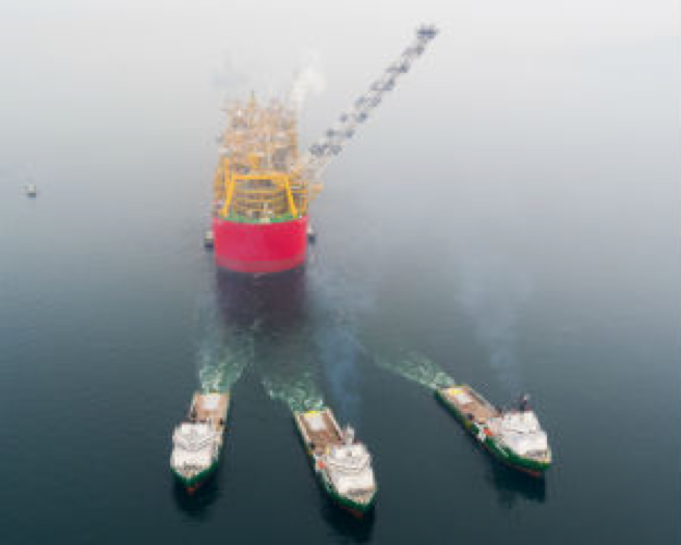 Prelude FLNG being towed to location - Source: Shell