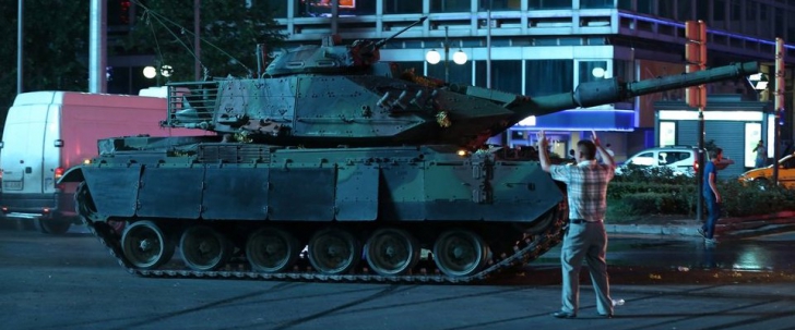 A man tries to stop a tank in Ankara in July 15, Turkey. (Image credit: Anadolu Agency)